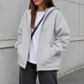 Casaco Feminino Oversize com Capuz e Zíper - Bolsos Duplos, Streetwear Solto e Quente para Inverno
